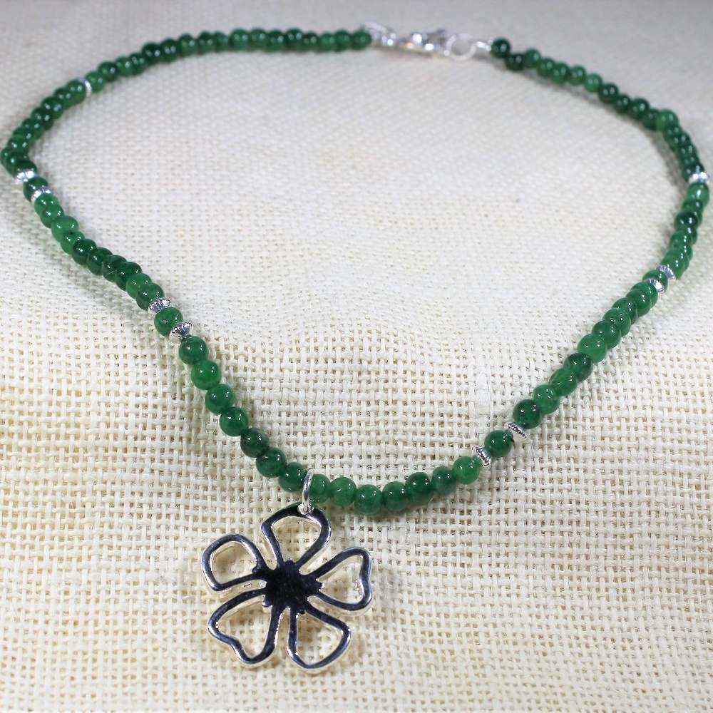 Emerald beaded necklace with silver flower pendant